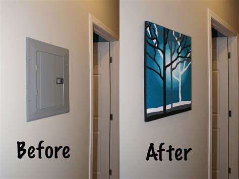 decorating when electric panel box is on entrance wall|electrical panel covering ideas.